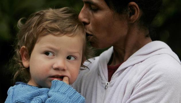 Indian nanny Sandra Samuel kisses Moshe Holtzberg, 2, orphan of Rabbi Gavriel Noach Holtzberg and his wife Rivkah, killed in the Mumbai Jewish center attack, in the garden of his relative's house in Migdal Ha-Emek, northern Israel. (AP Photo) Indian nanny Sandra Samuel kisses Moshe Holtzberg, 2, orphan of Rabbi Gavriel Noach Holtzberg and his wife Rivkah, killed in the Mumbai Jewish center attack, in the garden of his relative's house in Migdal Ha-Emek, northern Israel. (AP Photo)