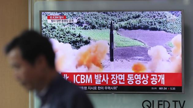 A man walks by a TV screen showing a local news program reporting about North Korea's missile firing on July 5, 2017. (AP Photo) A man walks by a TV screen showing a local news program reporting about North Korea's missile firing on July 5, 2017. (AP Photo)