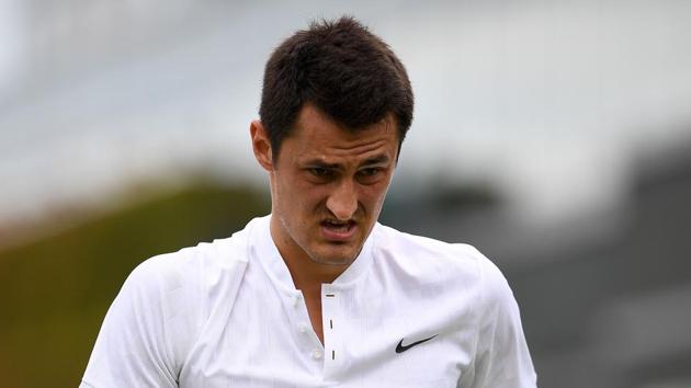 Australia's Bernard Tomic reacts during his Wimbledon men’s singles first round match against Germany's Mischa Zverev. (AFP) Australia's Bernard Tomic reacts during his Wimbledon men’s singles first round match against Germany's Mischa Zverev. (AFP)