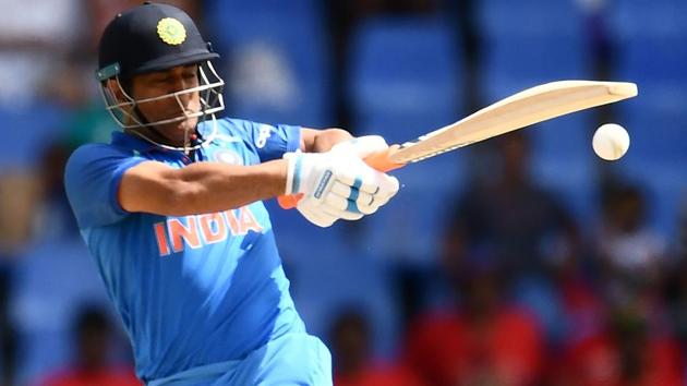 India's MS Dhoni plays a shot during the fourth One Day International (ODI) match against West Indies. (AFP) India's MS Dhoni plays a shot during the fourth One Day International (ODI) match against West Indies. (AFP)