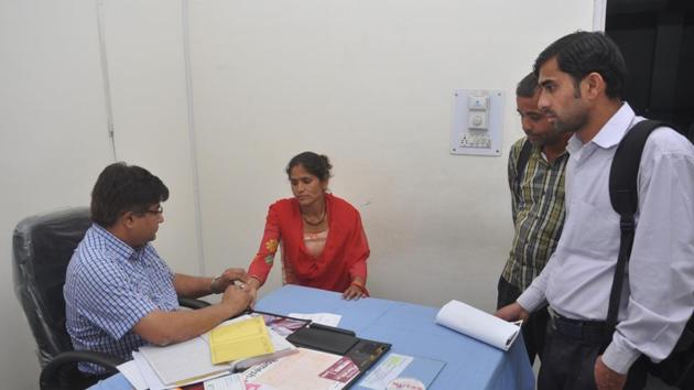 A doctor examining a patient at a Doon hospital. (HT File Photo)