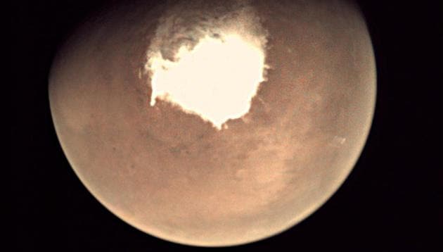 This handout picture released on October 16, 2016 by the European Space Agency (ESA) shows planet Mars as seen by the webcam on ESA’s Mars Express orbiter, as another mission, ExoMars, is about to reach the Red Planet. (AFP File Photo) This handout picture released on October 16, 2016 by the European Space Agency (ESA) shows planet Mars as seen by the webcam on ESA’s Mars Express orbiter, as another mission, ExoMars, is about to reach the Red Planet. (AFP File Photo)