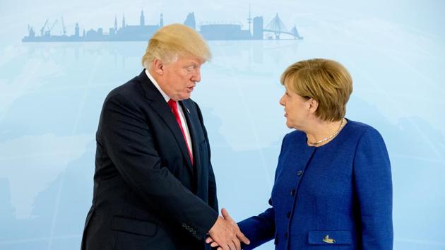German chancellor Angela Merkel meets US President Donald Trump on the eve of the G20 summit in Hamburg, Germany, on Thursday.(Reuters Photo)