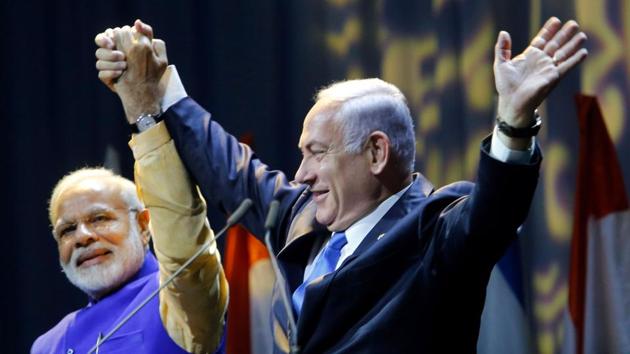 Prime Minister Narendra Modi with his Israeli counterpart Benjamin Netanyahu during a meeting with the Indian community in Tel Aviv. (AFP) Prime Minister Narendra Modi with his Israeli counterpart Benjamin Netanyahu during a meeting with the Indian community in Tel Aviv. (AFP)