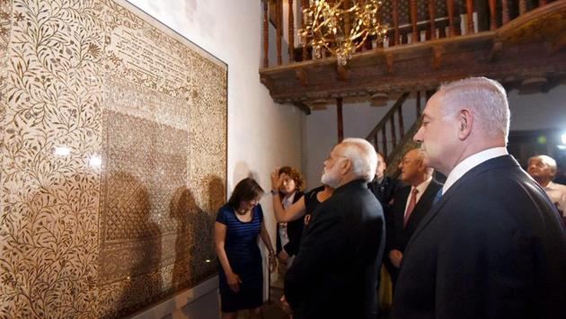 Narendra Modi and his counterpart from Israel Benjamin Netanyahu visit an exhibition on India-Jewish Heritage at Israeli museum in Jerusalem. According to a joint statement by India and Israel Prime Minister Modi announced the opening of an Indian Cultural Centre in Israel. Modi also presented Netanyahu replicas of copper plates from the 9th century, an ancient charter cherished by Cochin Jews. (PIB / PTI) 