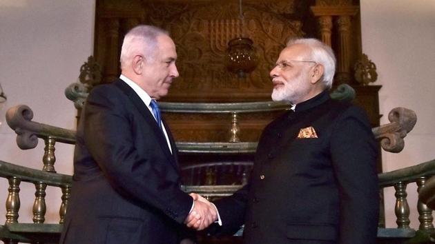 Prime Minister Narendra Modi and his counterpart from Israel Benjamin Netanyahu during their visit to Israeli museum to witness an exhibition on India-Jewish Heritage, in Jerusalem. (PTI Photo) Prime Minister Narendra Modi and his counterpart from Israel Benjamin Netanyahu during their visit to Israeli museum to witness an exhibition on India-Jewish Heritage, in Jerusalem. (PTI Photo)