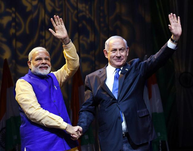 Narendra Modi and Benjamin Netanyahu at the Community Reception Programme in Tel Aviv on Wednesday. (PTI) Narendra Modi and Benjamin Netanyahu at the Community Reception Programme in Tel Aviv on Wednesday. (PTI)