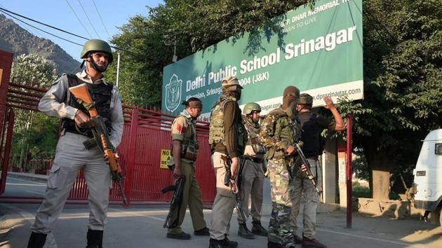 Special task force of police positioned outside a school during search operation in Srinagar. (PTI File Photo) Special task force of police positioned outside a school during search operation in Srinagar. (PTI File Photo)