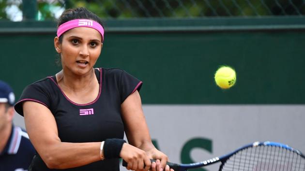 India's Sania Mirza comfortably won her Wimbledon women’s doubles opener on Wednesday.(AFP)
