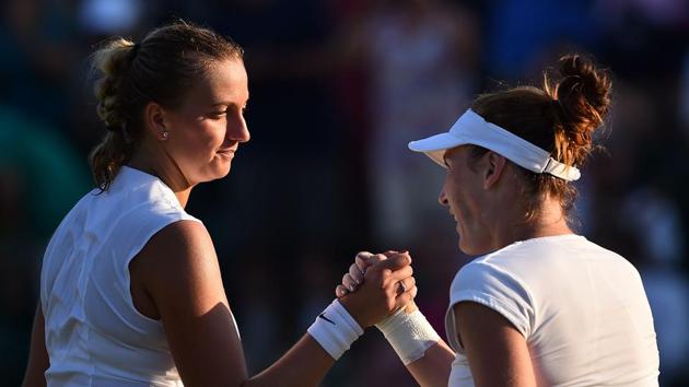 US player Madison Brengle (R) shakes hands with Czech Republic's Petra Kvitova after winning against her in their women's singles second round match on the third day of the 2017 Wimbledon Championships. (AFP) US player Madison Brengle (R) shakes hands with Czech Republic's Petra Kvitova after winning against her in their women's singles second round match on the third day of the 2017 Wimbledon Championships. (AFP)