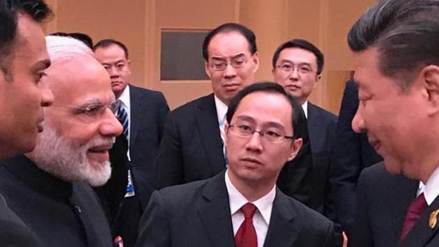 PM Narendra Modi greets Chinese President Xi jinping ahead of the first day of the G20 summit in Hamburg. (cOURTESY- MEA)