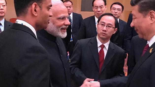 Prime Minister Narendra Modi greets Chinese President Xi Jinping at the BRICS leaders’ informal gathering in Hamburg, Germany, on Friday. (ANI Twitter) Prime Minister Narendra Modi greets Chinese President Xi Jinping at the BRICS leaders’ informal gathering in Hamburg, Germany, on Friday. (ANI Twitter)