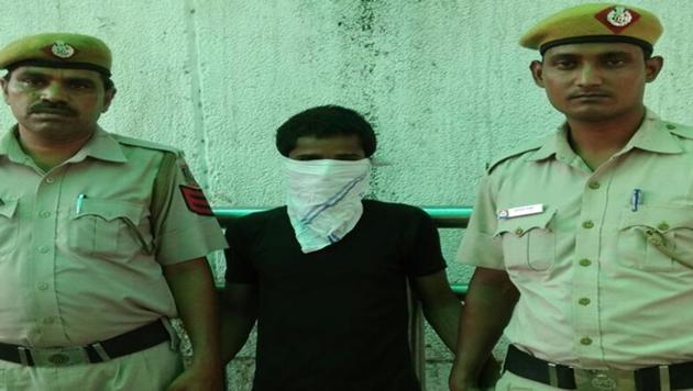 The accused in police custody. The man had kidnapped the minor girl and raped her. He smothered her to death and put his body in a steel trunk and threw it in a drain in Usmanpur. The girl’s decomposed body was found 10 days ago. (Handout Photo) The accused in police custody. The man had kidnapped the minor girl and raped her. He smothered her to death and put his body in a steel trunk and threw it in a drain in Usmanpur. The girl’s decomposed body was found 10 days ago. (Handout Photo)