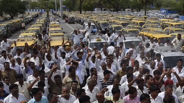 More than 2,000 cabbies have gone on strike and have stopped pre-paid taxi booking from the international airport, said another union leader.(Satish Bate/HT)