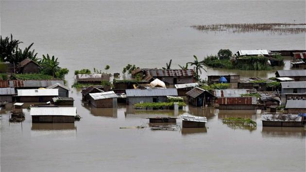 A view of the flooded Katoguri village in Morigaon district.The flood-affected districts are Lakhimpur, Jorhat, Golaghat, Sivasagar, Cachar, Dhemaji, Biswanath, Karimganj, Sonitpur, Hojai, Majuli, Barpeta, Chirang, Nagaon and Nalbari. (PTI)