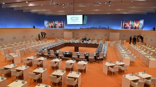 Preparations are under way at the plenary hall of the G20 summit in Hamburg, northern Germany. (AFP)