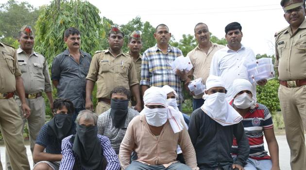 The Ghaziabad Police on Friday arrested seven members of a gang who robbed a petrol pump owner of Rs 12.76 lakh, near Hindon airbase in Ghaziabad.(Sakib Ali/ HT Photo)