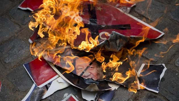 Activists of Swadeshi Jagaran Manch, a Hindu right wing organization promoting indigenous products, burn portraits of Chinese President Xi Jinping during a protest in New Delhi. (AP) Activists of Swadeshi Jagaran Manch, a Hindu right wing organization promoting indigenous products, burn portraits of Chinese President Xi Jinping during a protest in New Delhi. (AP)