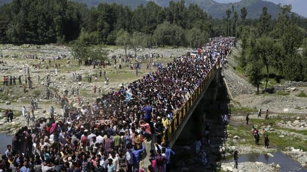 Kashmiri villagers carry the body of Bashir Lashkari, a local rebel commander during his funeral in his native village of Souf, 75 kilometres (46 miles) south of Srinagar, Kashmir. (AP) Kashmiri villagers carry the body of Bashir Lashkari, a local rebel commander during his funeral in his native village of Souf, 75 kilometres (46 miles) south of Srinagar, Kashmir. (AP)