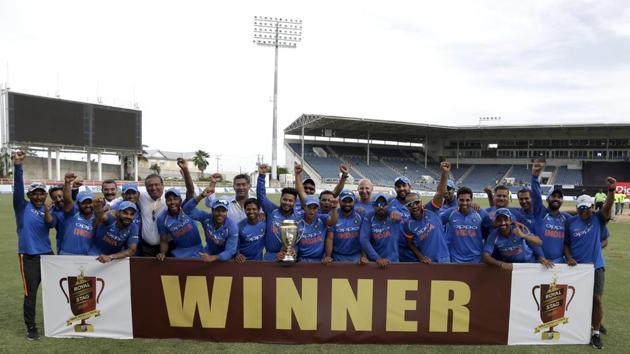 Indian cricket team players celebrate with the trophy after beating the West Indies 3-1 in the five-match One-Day International series at Sabina Park in Kingston on Thursday. (AP) Indian cricket team players celebrate with the trophy after beating the West Indies 3-1 in the five-match One-Day International series at Sabina Park in Kingston on Thursday. (AP)
