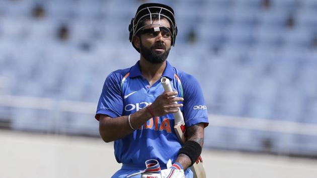 Indian captain Virat Kohli gestures after scoring half a century against West Indies during their fifth ODI at Sabina Park cricket ground in Kingston, Jamaica. (AP) Indian captain Virat Kohli gestures after scoring half a century against West Indies during their fifth ODI at Sabina Park cricket ground in Kingston, Jamaica. (AP)