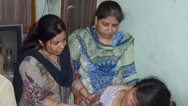 Family members of the deceased grieving in Ludhiana on Friday. (HT Photo) Family members of the deceased grieving in Ludhiana on Friday. (HT Photo)