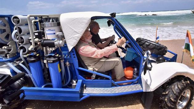 Modi and Netanyahu seen driving together in the mobile water desalination unit. (PTI) Modi and Netanyahu seen driving together in the mobile water desalination unit. (PTI)