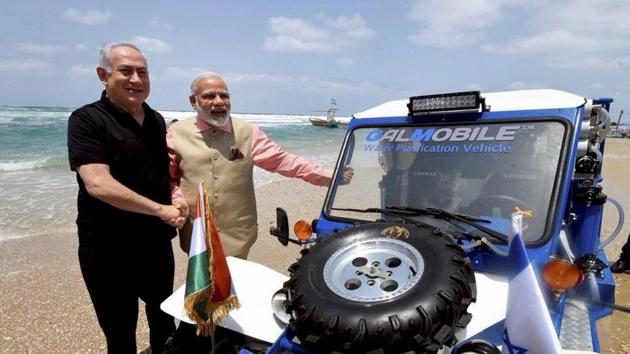 Prime Minister Narendra Modi with his Israeli counterpart Benjamin Netanyahu during a visit to the Olga Beach in Israel, July 6, 2017(PTI)