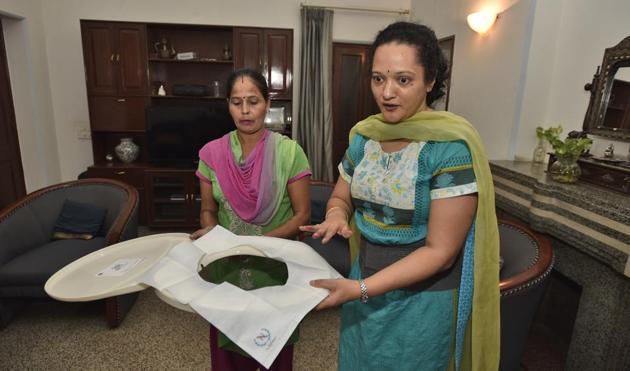 One of Delhi homemaker Neena Narayan’s Sit Free toilet seat covers, which come in little pouches you can slip into your purse.(Burhaan Kinu / HT Photo)