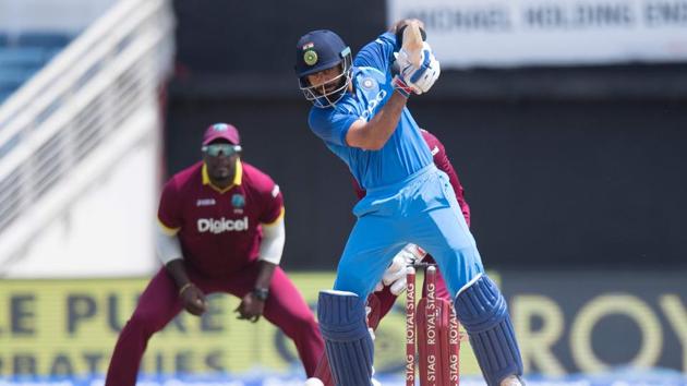 India captain Virat Kohli plays a shot during the fifth One Day International (ODI) match between West Indies and India at the Sabina Park Cricket Ground in Kingston, Jamaica.(AFP)