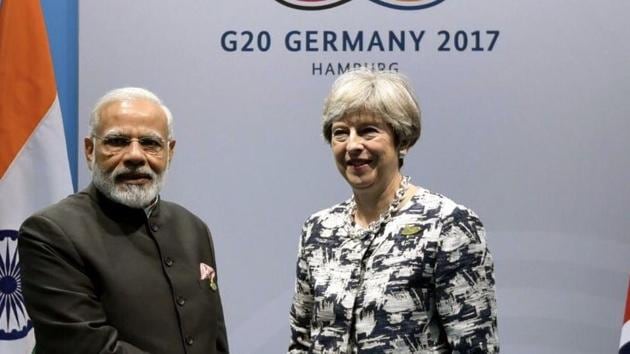 Prime Minister Narendra Modi (L) with UK counterpart Theresa May in Hamburg, Germany, on Saturday. (Twitter) Prime Minister Narendra Modi (L) with UK counterpart Theresa May in Hamburg, Germany, on Saturday. (Twitter)