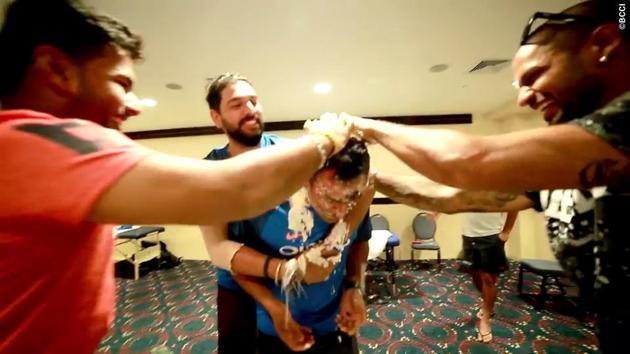 This doesn’t stop them from putting more cake on his face anyway.  (BCCI) 