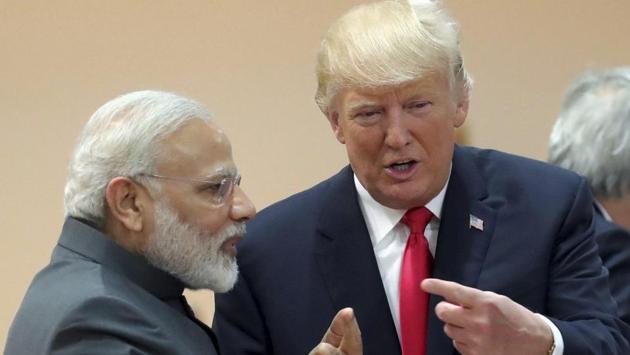 India's Prime Minister Narendra Modi in conversation with U.S. president Donald Trump during a working session of the G20 summit in Hamburg. (AP)