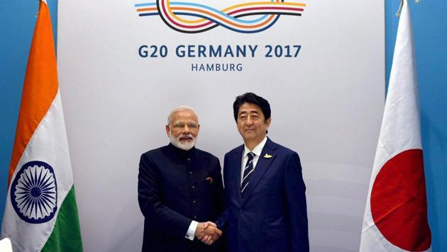 Hamburg : Prime Minister Narendra Modi with Japanese Prime Minister Shinzo Abe at the G-20 Summit in Hamburg. (PTI) Hamburg : Prime Minister Narendra Modi with Japanese Prime Minister Shinzo Abe at the G-20 Summit in Hamburg. (PTI)