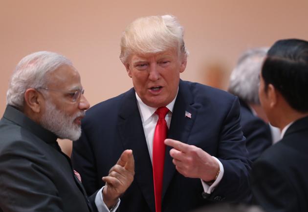US President Donald Trump chats with Prime Minister Narendra Modi on the second day of the G20 economic summit in Hamburg, Germany, on Saturday. (Getty Images) US President Donald Trump chats with Prime Minister Narendra Modi on the second day of the G20 economic summit in Hamburg, Germany, on Saturday. (Getty Images)