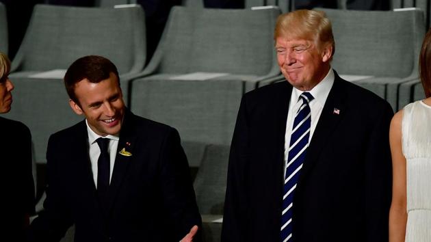French President Emmanuel Macron (2ndL) and his wife Brigitte Trogneux (L) and US President Donald Trump and US First Lady Melania Trump attend a concert at the Elbphilharmonie concert hall during the G20 Summit in Hamburg. (AFP Photo) French President Emmanuel Macron (2ndL) and his wife Brigitte Trogneux (L) and US President Donald Trump and US First Lady Melania Trump attend a concert at the Elbphilharmonie concert hall during the G20 Summit in Hamburg. (AFP Photo)