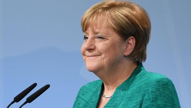 German Chancellor Angela Merkel speaks during the final press conference on the second day of the G20 Summit in Hamburg, Germany, July 8, 2017. L (AFP) German Chancellor Angela Merkel speaks during the final press conference on the second day of the G20 Summit in Hamburg, Germany, July 8, 2017. L (AFP)