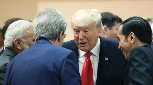 U.S. President Donald Trump, centre right, chats with Indian Prime Minister Narendra Modi, left, and Italian Prime Minister Paolo Gentiloni, centre left, and Indonesian President Joko Widodo, right, prior to a working session at the G-20 summit . (AP)