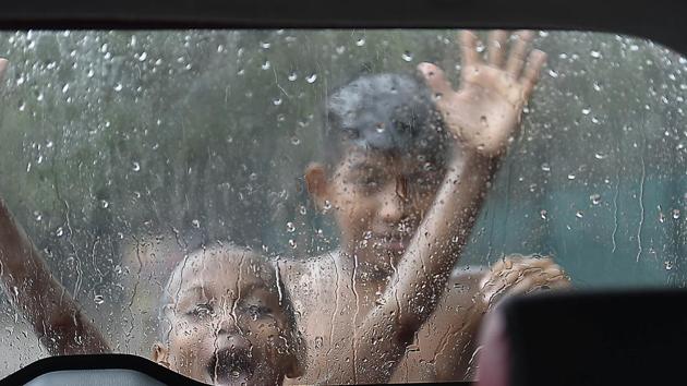 Children enjoy pre-monsoon rain in New Delhi, June 28(Raj K Raj/HT PHOTO)