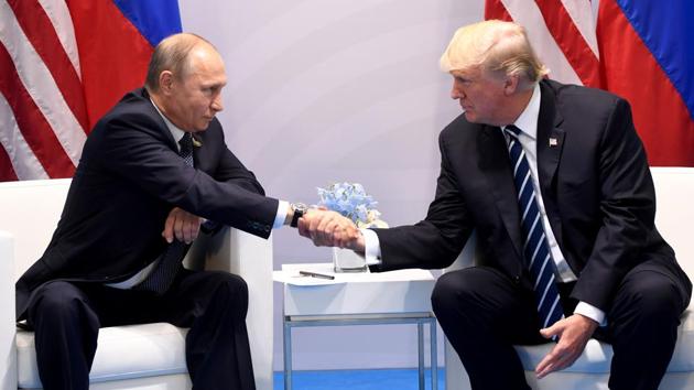 US President Donald Trump and Russia's President Vladimir Putin shake hands during a meeting on the sidelines on the second day of the G20 Summit in Hamburg. U.S. President Donald Trump on Saturday promised $639 million in funding for humanitarian programmes, including $331 million to help feed starving people in four famine-hit countries - Somalia, South Sudan, Nigeria and Yemen. (AFP)
