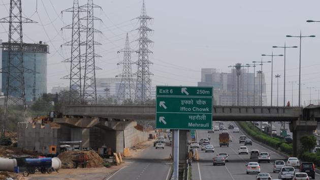 The NHAI will have to remove 12 electricity towers for construction of elevated U-turns at the Iffco Chowk flyover.(Parveen Kumar/HT Photo)