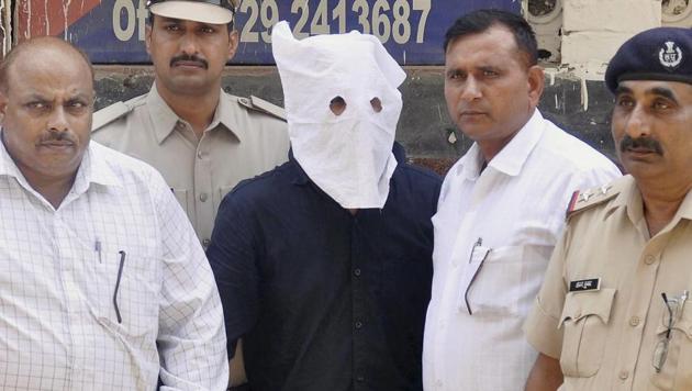The main accused in Junaid Khan lynching case, before being produced in district court Faridabad on Sunday.(PTI Photo) The main accused in Junaid Khan lynching case, before being produced in district court Faridabad on Sunday.(PTI Photo)