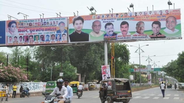 Hoardings with pictures of Congress leaders, including Jyotiraditya Scindia, holding the Kisan Sammelan (farmers’ convention) in Lahar are seen on a road in Gwalior. (Mujeeb Faruqui/HT Photo) Hoardings with pictures of Congress leaders, including Jyotiraditya Scindia, holding the Kisan Sammelan (farmers’ convention) in Lahar are seen on a road in Gwalior. (Mujeeb Faruqui/HT Photo)