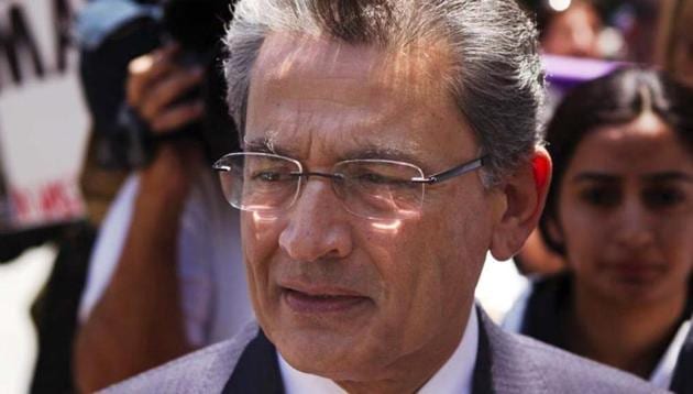 File photo of former Goldman Sachs Group Inc board member Rajat Gupta leaving Manhattan Federal Court following a guilty verdict in his trial in New York. (Reuters File Photo) File photo of former Goldman Sachs Group Inc board member Rajat Gupta leaving Manhattan Federal Court following a guilty verdict in his trial in New York. (Reuters File Photo)