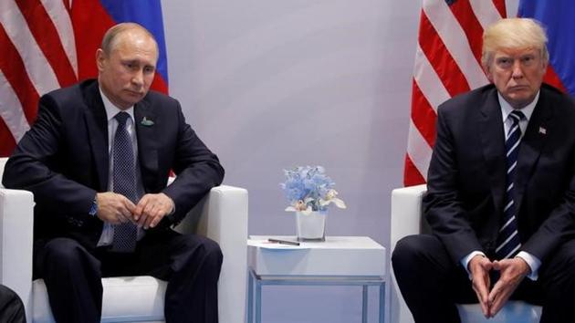 US President Donald Trump meets with Russian President Vladimir Putin during their bilateral meeting at the G20 summit in Hamburg, Germany on July 7. (Reuters) US President Donald Trump meets with Russian President Vladimir Putin during their bilateral meeting at the G20 summit in Hamburg, Germany on July 7. (Reuters)
