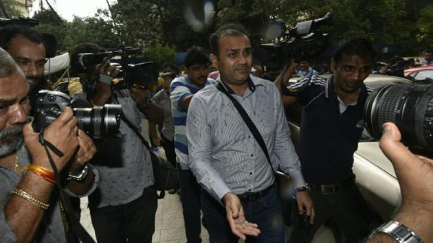 Virender Sehwag leaves the Cricket Centre after his interview. Get highlights of the Indian cricket team coach selection here(HT Photo/Kunal Patil)