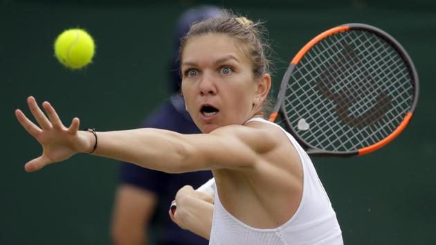 Simona Halep defeated Victoria Azarenka 7-6(3) 6-2. (AP)