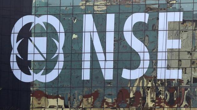Buildings are reflected on the glass windows of the NSE (National Stock Exchange) building in Mumbai.(Reuters) Buildings are reflected on the glass windows of the NSE (National Stock Exchange) building in Mumbai.(Reuters)