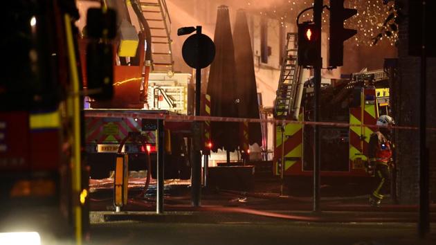 A firefighter walks near a fire, it is the second major fire incident in London in recent weeks. (REUTERS) A firefighter walks near a fire, it is the second major fire incident in London in recent weeks. (REUTERS)