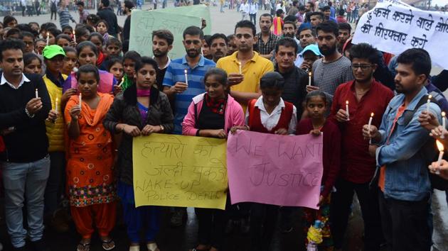 Locals took out a candle-light march on the Ridge, Shimla, on Monday(Deepak Sansta/HT Photo) Locals took out a candle-light march on the Ridge, Shimla, on Monday(Deepak Sansta/HT Photo)